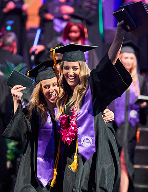 GCU grads waving